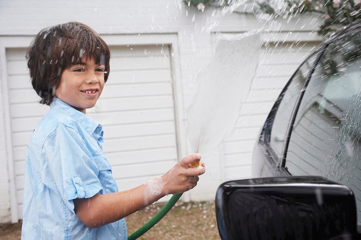 child washing car