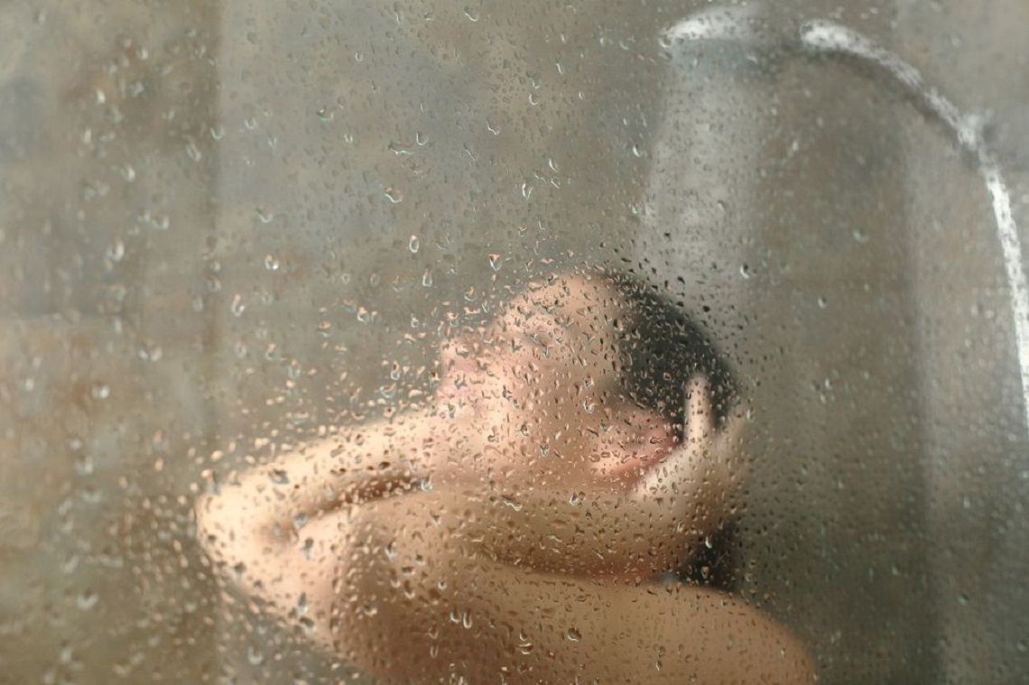 Blurry Woman in Hot Shower