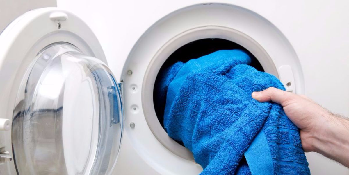 blue towel coming out of the washer